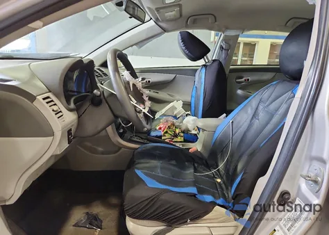 2009 Toyota Corolla Base from USA, damaged, VIN 1NXBU40E29Z066311